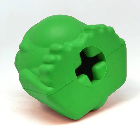The SodaPup Bull Frog EDispenser Durable Rubber Chew Toy & Treat Dispenser - Large is a bright green ball with textured bumps and a cross-shaped treat hole, shown against a plain white background.