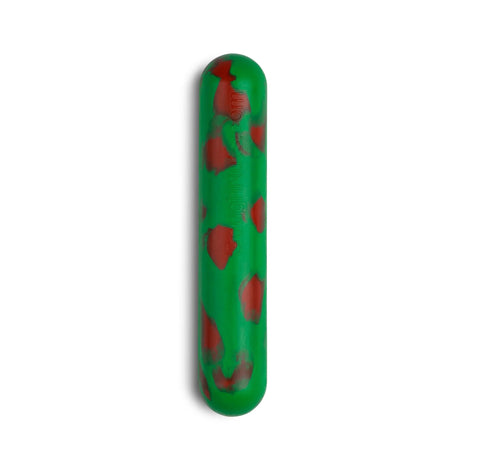The Goughnuts Medium Stick, a green cylindrical dog toy with irregular red patches, is USA-made and designed for medium breeds (30-70 lbs), shown on a white background.