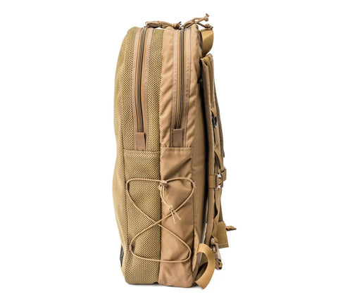 The MIS Mesh Backpack - Coyote Brown is a 19L laptop backpack made in the USA, featuring two main zippered compartments, mesh paneling, a front elastic cord, and adjustable shoulder straps.