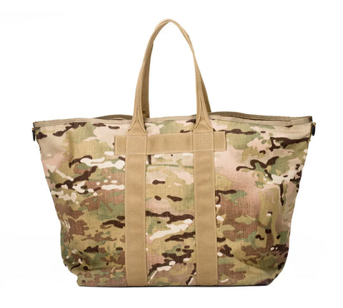 The MIS Super Tote Bag - Multi Cam is a large USA-made tote with tan handles and a green, brown, and beige camouflage pattern set against a white background.
