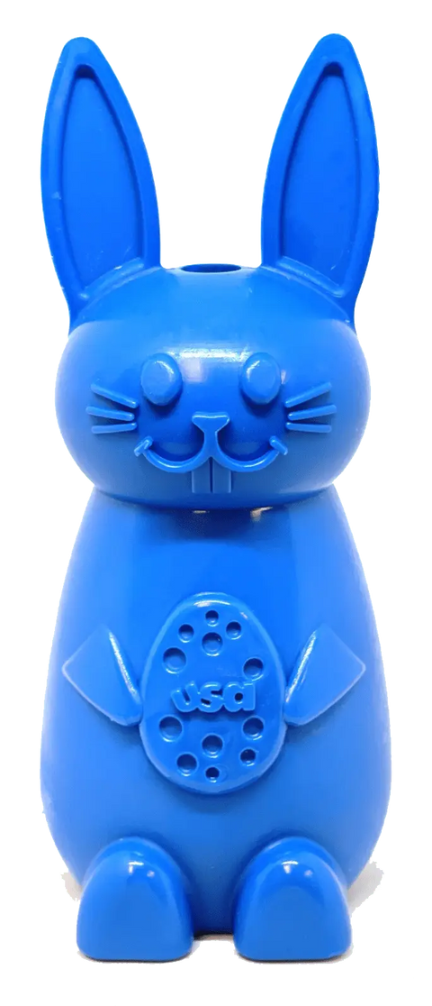 The SodaPup Bunny EChew Durable Nylon Chew and Enrichment Toy is a blue bunny-shaped dog toy with a smiling face, pointy ears, whiskers, and holes—designed for power chewer dogs.