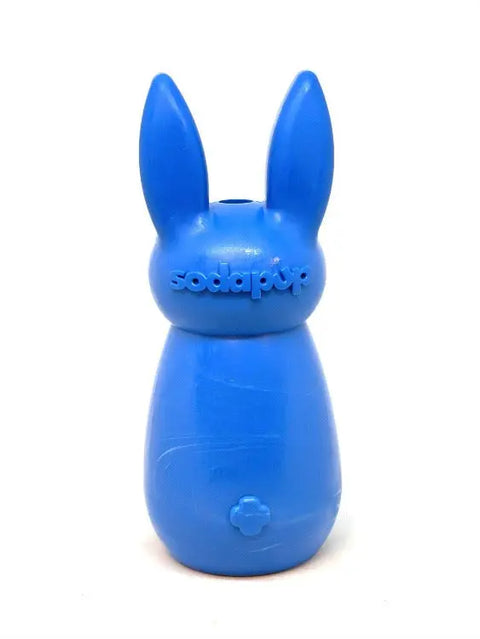 The Bunny EChew Durable Nylon Chew and Enrichment Toy by SodaPup features long ears, a blue finish, “SodaPup” embossed on its face, and a small flower detail—perfect for playful pups.