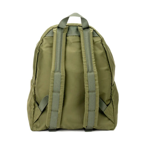 The MIS Daypack - Olive Drab is a green nylon backpack shown from the back, with two padded shoulder straps, a top handle, and a minimalist design that fits a 13” laptop, set against a white background.