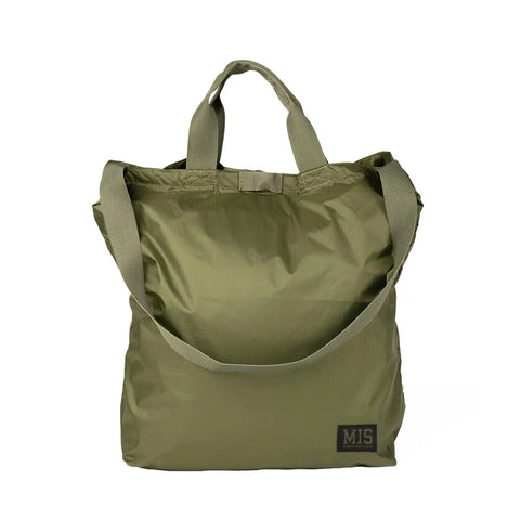 The MIS Carrying Bag Ripstop - Olive is made in the USA from water-resistant ripstop nylon, featuring short handles, a detachable shoulder strap, and a small black MIS logo patch on the lower front corner.