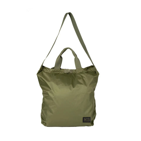 The MIS Carrying Bag Ripstop - Olive is made in the USA with short handles, a long shoulder strap, and a small black MIS patch on the lower right. Crafted from durable, water-resistant Ripstop Nylon.