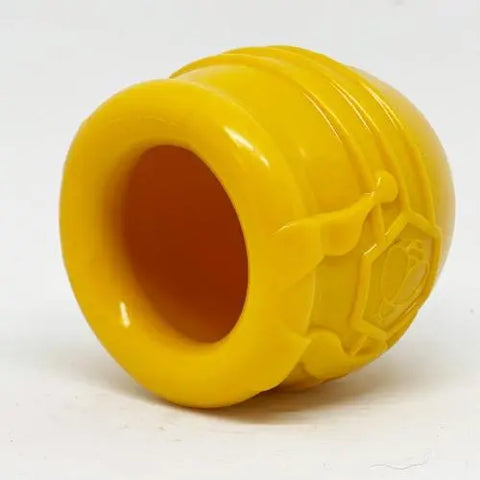 The SodaPup Honey Pot Durable PUP-X Rubber ECup Treat Dispenser & Enrichment Toy features a yellow design with honey drip details and a wide round opening, making it perfect for dispensing treats to pets.