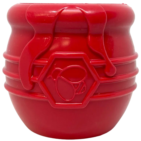 The SodaPup Honey Pot Durable PUP-X Rubber ECup Treat Dispenser & Enrichment Toy is a small, red honey pot-shaped toy with honey drips and a bee emblem.