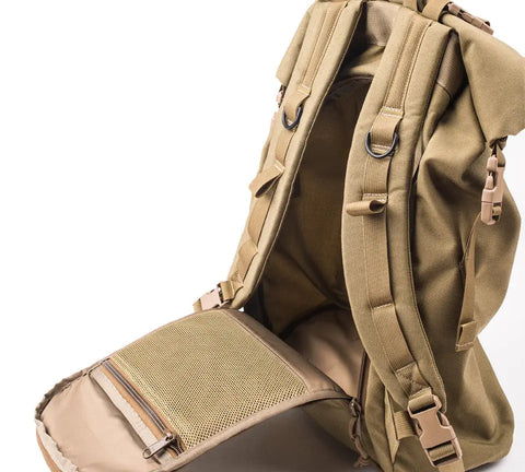 The MIS Roll Up Backpack - Coyote Tan (30L) is made in the USA from durable Cordura nylon. Shown open on a white background, it reveals a spacious interior and a mesh pocket on the inside flap.