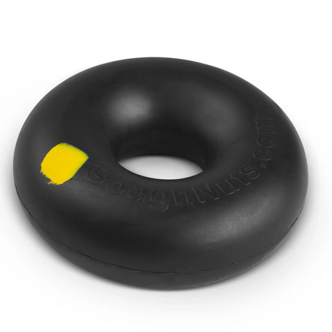 The Goughnuts Small Ring is a durable, black, doughnut-shaped dog toy for dogs 10-40 lbs. Made in the USA, it features a small yellow patch and GoughNuts.com embossed on the surface—ideal for playful pups.