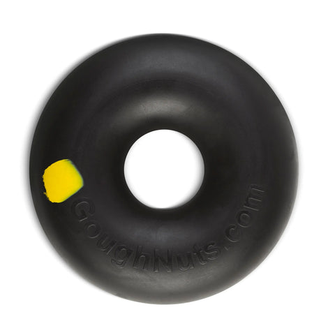 The Goughnuts Small Ring (for dogs 10-40 pounds) is a black, donut-shaped dog toy with a yellow spot, GoughNuts.com embossed on the smooth surface, and a hollow center—ideal for active pups.