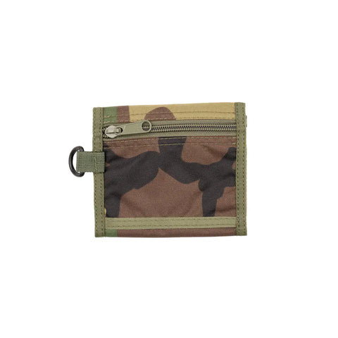 The MIS Folding Wallet - Woodland Camo is a nylon wallet made in the USA, featuring a camouflage pattern, front zippered coin pocket, and a metal ring on the left side, shown against a white background.