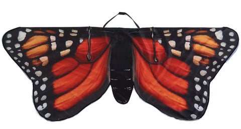 The Kids Butterfly Wings by Spiritex | Sustainable Apparel are wearable wings for kids, crafted from recycled PET and featuring vibrant orange, black, and white monarch patterns with convenient straps.