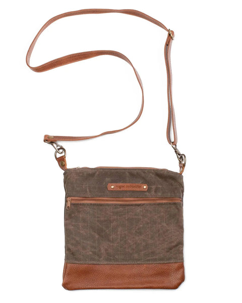 The Rogue Industries Ellis River Crossbody Bag has a brown waxed canvas body, leather accents and trim, a long adjustable strap, front zipper pocket, and a leather logo patch for versatile style.