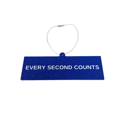 The Every Second Counts Christmas Ornament by Chatelet Manufacturing features a blue rectangular tag with white text and a thin white string—an inspirational holiday ornament made in the USA.
