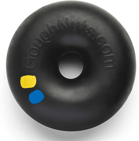 The Goughnuts XL Ring is a black, donut-shaped rubber dog toy with yellow and blue ovals, designed for aggressive chewers over 100 lbs. It is durable and features GoughNuts.com embossed on the side.
