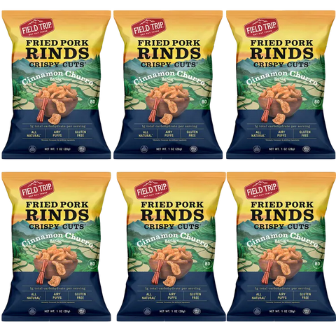 Six bags of Field Trip Cinnamon Churro 1oz (6 Pack) snacks are displayed in two rows of three. The vibrant packaging features pork rinds, cinnamon sticks, and churros, highlighting these gluten free and keto friendly treats.