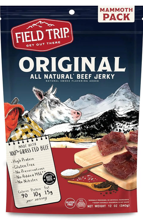 Field Trip Original Beef Jerky 12oz features a cartoon cow before mountains, hickory smoked jerky slices, and highlights like high protein, gluten free, and no preservatives.