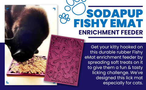 A black cat licks soft treats from a purple Fishy Design EMat Enrichment Lick Mat - Small by SodaPup. Next to the cat is an image of the mat and text promoting this calming, playful fish-themed feeder for cats.