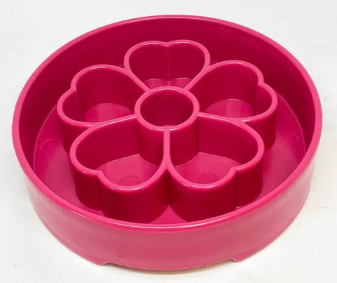 The SodaPup Flower Design EBowl Enrichment Slow Feeder Bowl for Dogs is a round, bright pink plastic tray with five heart-shaped sections and a central compartment, resembling a flower. It is shown on a plain white background.