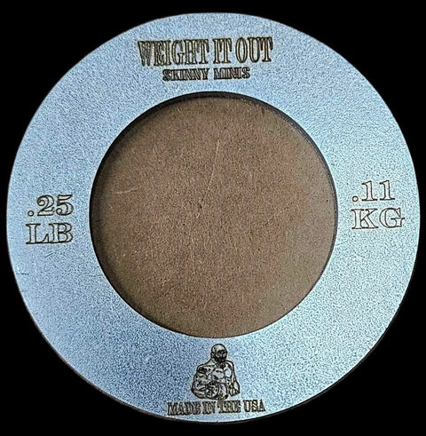 The Weight It Out Fractional Solid Steel Mini Olympic Weight Plate is a circular silver plate marked .25 LB/.11 KG, labeled SKINNY MINUS, with a small person graphic and Made in the USA—perfect for gradual increases on Olympic bars.