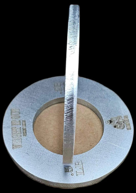 The Weight It Out Fractional Solid Steel Mini Olympic Weight Plates feature a circular metallic design with a raised center strip, cutout middle, and engraved details that contrast shiny and matte finishes on a black background.