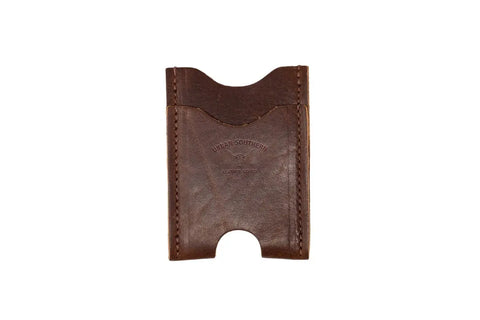 A Money Clip Wallet by Urban Southern, made of brown leather with visible stitching and the brand embossed on the front, shown against a white background.
