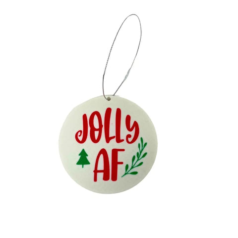 The Funny Gag Gift Christmas Ornament by Chatelet Manufacturing is a round white decoration with JOLLY AF in red, a green pine tree and leaf, and a silver hanging string—perfect for adding humor to your holiday décor or as a dirty Santa gift! Made in USA.