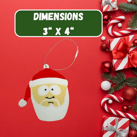 The Chatelet Manufacturing Funny Gag Gift Christmas Ornament features a flat Santa face with red hat and white beard on a red background with gifts, candy canes, and pine branches. DIMENSIONS 3 X 4 shown in white on a green box. Made in USA.