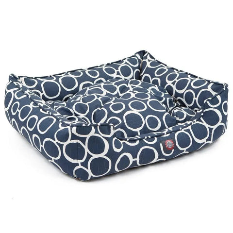 The Fusion Contemporary Lounge Bed by Majestic Pet is a square navy blue dog bed with white circles, raised sides, and a cushioned center for comfort. Made with durable upholstery, it’s also machine washable for easy cleaning.