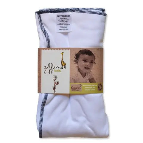 A folded white Geffenbaby Jersey Cloth Diaper Prefold (60% hemp, 40% organic cotton) with dark stitched edges; packaging features a baby’s photo and highlights its use as a soft, reusable diaper or diaper insert.
