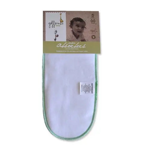 A white cloth burp pad with green trim is shown in packaging. The label features a baby’s photo, product info, and the brand name “Geffenbaby” with “Super Absorbers Cloth Diaper Inserts,” ideal for eco-conscious diapering or as inserts.