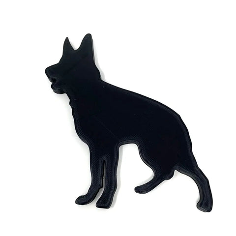 The German Shepherd Fridge Magnet by Chatelet Manufacturing features a black silhouette of a sitting dog on a white background—perfect for your refrigerator and an ideal gift for dog lovers. Made in the USA.