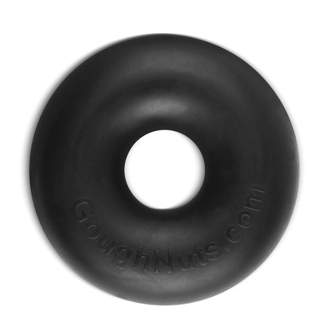 A black, donut-shaped rubber chew toy for dogs 30-70 lbs from Goughnuts, featuring GoughNuts.com embossed on the surface. Shown on a white background and covered by the Goughnuts Guarantee for durable dog toys.