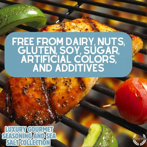 Grilled chicken and veggies on a barbecue grill. Text: “Free from dairy, nuts, gluten, soy, sugar, artificial colors, and additives.” Bottom text: “Gustus Vitae Gourmet Seasoning & Sea Salt Gift Set – 6 Tin Collection. Handcrafted in USA.”.