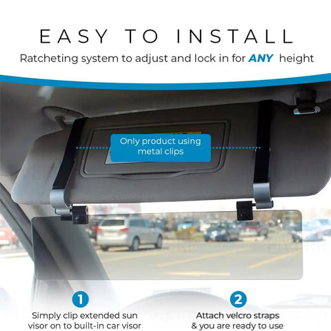 The Glare Guard Gray Polarized Car Visor Extender attaches with metal clips and velcro straps to your car’s visor. Its adjustable ratcheting system reduces glare for safer driving. A parking lot is visible through the windshield.