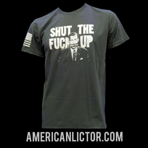 The Collab Tee: Grimzy-STFU by American Lictor features “SHUT THE FUCK UP” in bold white above a suited man, an American flag on the sleeve, and “AMERICANLICTOR.COM” at the bottom. Made from compacted ring-spun cotton for comfort.
