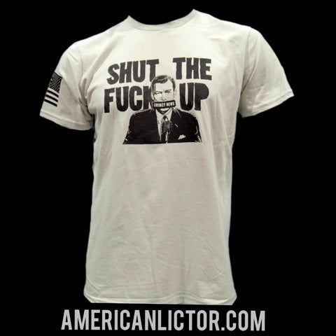 The Collab Tee: Grimzy-STFU by American Lictor is a white, compacted ring-spun cotton shirt featuring a suited man with “SHUT THE FUCK UP” above, an American flag on the sleeve, and “AMERICANLICTOR.COM” at the bottom. Size guide available.