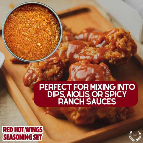 A bowl of Gustus Vitae Red Hot Wing Spice sits above saucy wings on a wooden board. Perfect for dips, aioli, or spicy ranch. Discover the gourmet Gustus Vitae Red Hot Wing Spice Set—seasonings crafted in the USA.