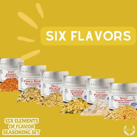 Six Gustus Vitae seasoning containers from the Six Flavor Seasoning Set are displayed in a row, each labeled with a unique artisan blend. Text above reads "Six Flavors." Made in USA, this gourmet spice collection adds bold taste to your dishes.