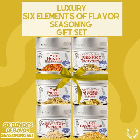 The Gustus Vitae Six Flavor Seasoning Set, a gourmet spice collection made in the USA, features six artisanal blends—Hot Honey BBQ, Fried Rice, Dill Pickle, White Cheddar & Chive, Sweet & Salty Popcorn, and Spicy Sesame Ginger—accented by a yellow bow.