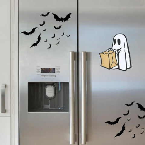 Chatelet Manufacturings Halloween Decorative Fridge Magnets, featuring flying bats and a cartoon ghost with a bag, add spooky flair to your fridge—perfect party decorations for Halloween. Made in the USA.