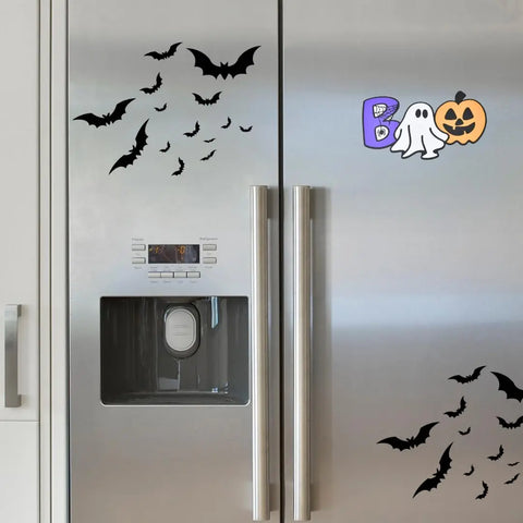 A silver fridge decorated with Chatelet Manufacturing’s Halloween Decorative Fridge Magnets—black bat stickers and a colorful Boo decal with a ghost and jack-o’-lantern—for fun, spooky Halloween party decor. Made in USA.