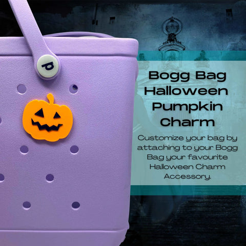 A close-up of a purple Tote Bag with a button and an orange Jack O Lantern charm. Text reads: BOGLETS - Halloween Tote Bag Charms Compatible With Bogg Bags by Chatelet Manufacturing. Personalize your bag for a festive look!.