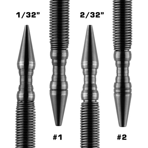 Four steel tools from the Hammerless Impact Technology Dual Nail Starter and Setter Kit are shown vertically. The left two are labeled 1/32” and 1, the right two 2/32” and 2. Each American-made tool features unique ridged shafts and grooves.
