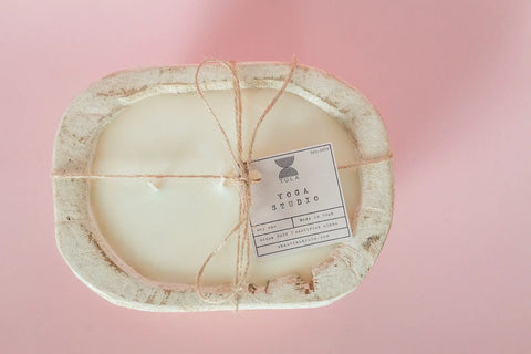 The Hand-Poured Soy Dough Bowl Candle – Oval 3-Wick by Shanti + Tula features rustic and antique white options, crafted in the USA—perfect for adding a cozy touch to your space.