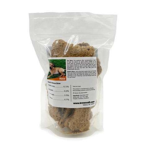 Rosies Autumn Brew by Brewscuits comes in a clear, resealable bag with a white label showing Rosie’s photo, details, and nutrition info. These brown, textured treats are made with natural ingredients to support your dogs digestive health.