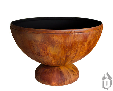 The Fire Chalice Fire Bowl by Ohio Flame is a large, round, rust-colored bowl with a wide opening and sturdy short base, American made and displayed against a white background.