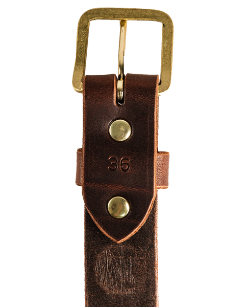 The Homestead Brand Essential Leather Belt No. 1508 features brown leather, a solid brass buckle, two brass rivets, and “36” stamped by the buckle. Made in the USA, it’s sturdy and well-crafted.