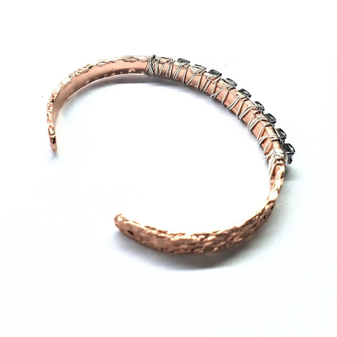 The Set of Glamorously Wrapped Hammered Rhinestone Crystal Bling Bangles by Alexa Martha Designs features textured, open-ended copper bangles with sparkling rhinestone accents, displayed on a white background.