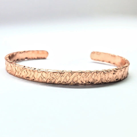 The Set of Glamorously Wrapped Hammered Rhinestone Crystal Bling Bangles by Alexa Martha Designs is displayed on a white background, showcasing their handcrafted, textured wire and sparkling geometric pattern.